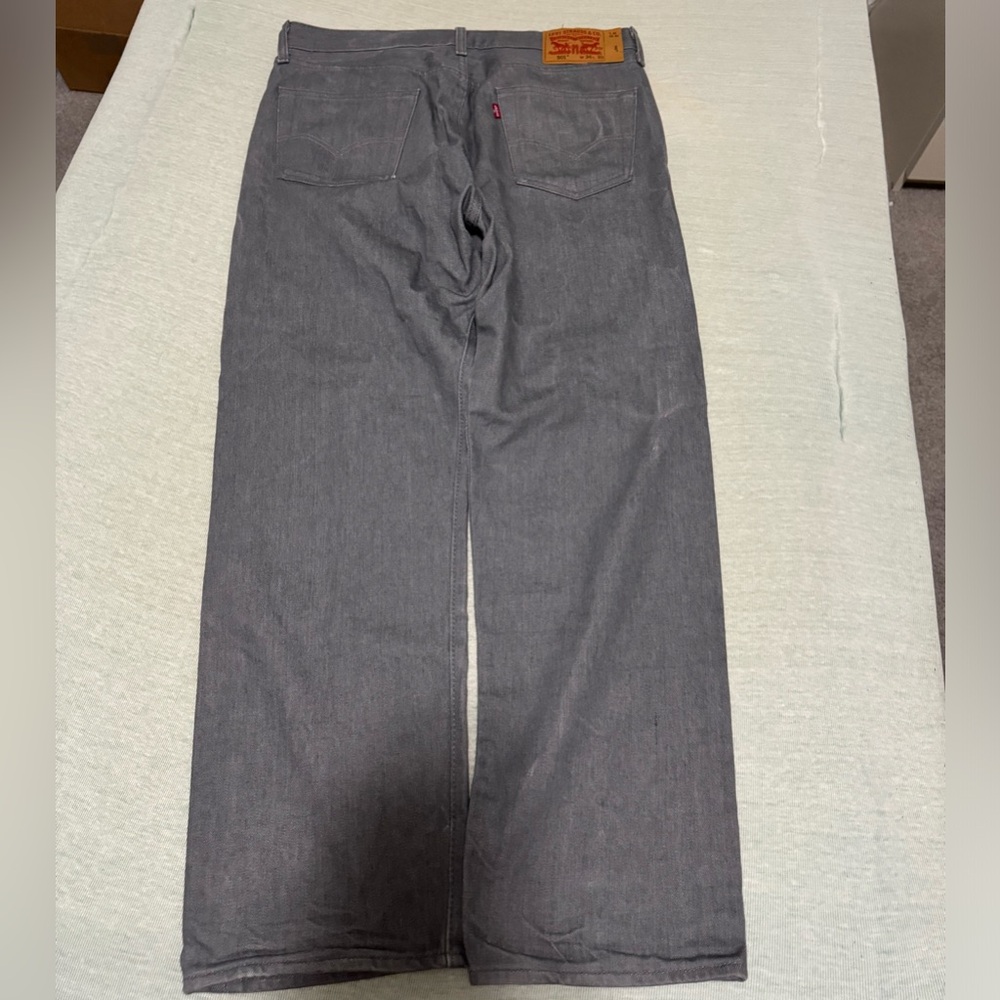 silver gray Levi’s 501 jeans